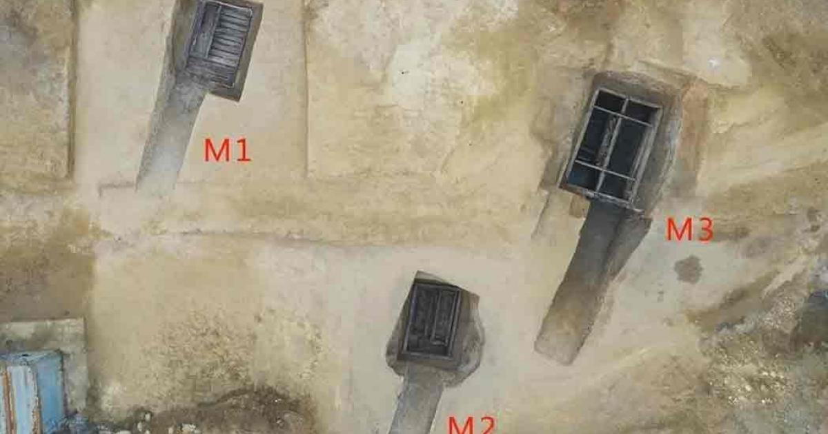 A family tomb built like a house.