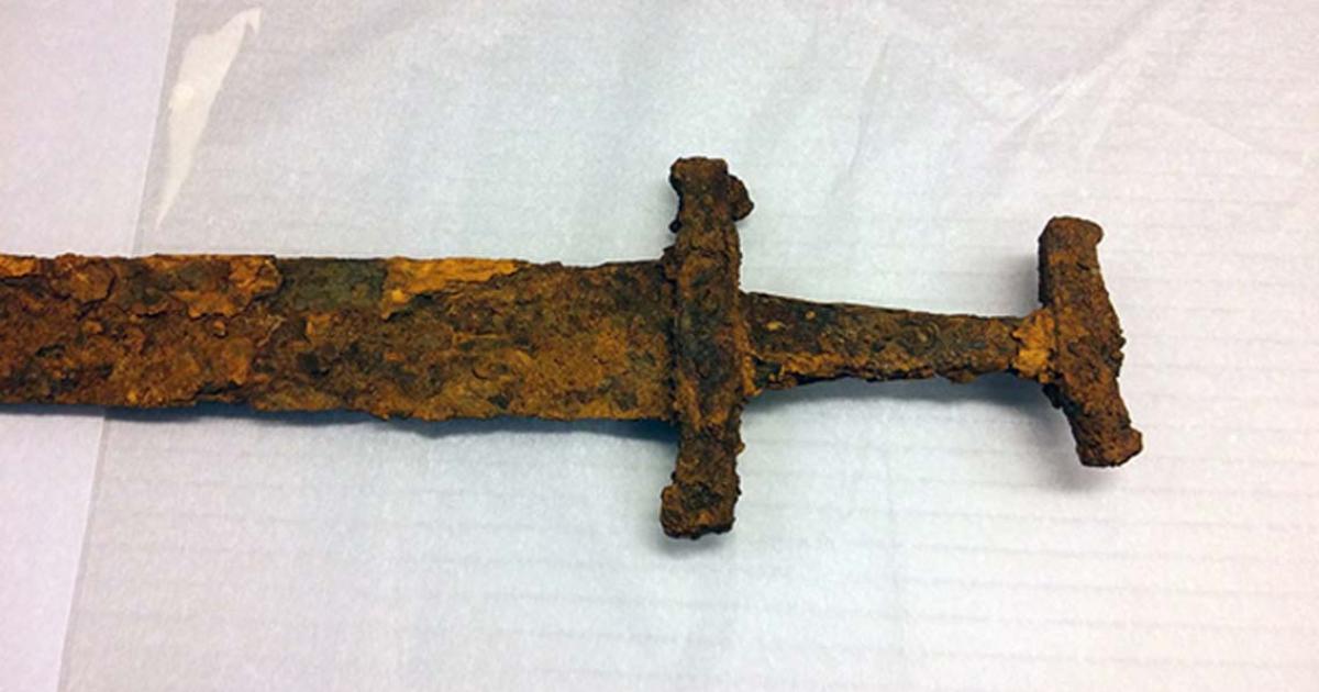 A sword left in the sand.