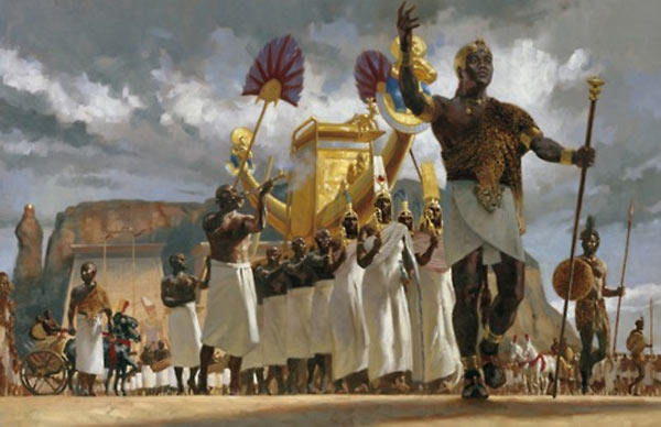 A gilt silver mask of a queen