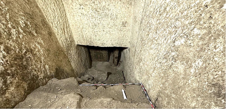 Two coffins, one inside the other.