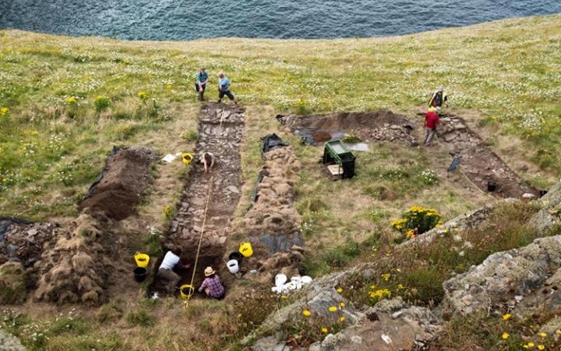 Palace walls and far-off pottery at Tintagel