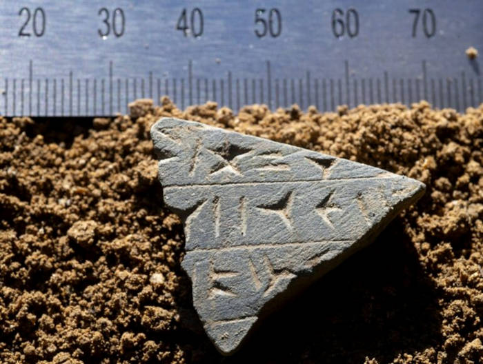 Stone pieces with cuneiform letters, found in a cave